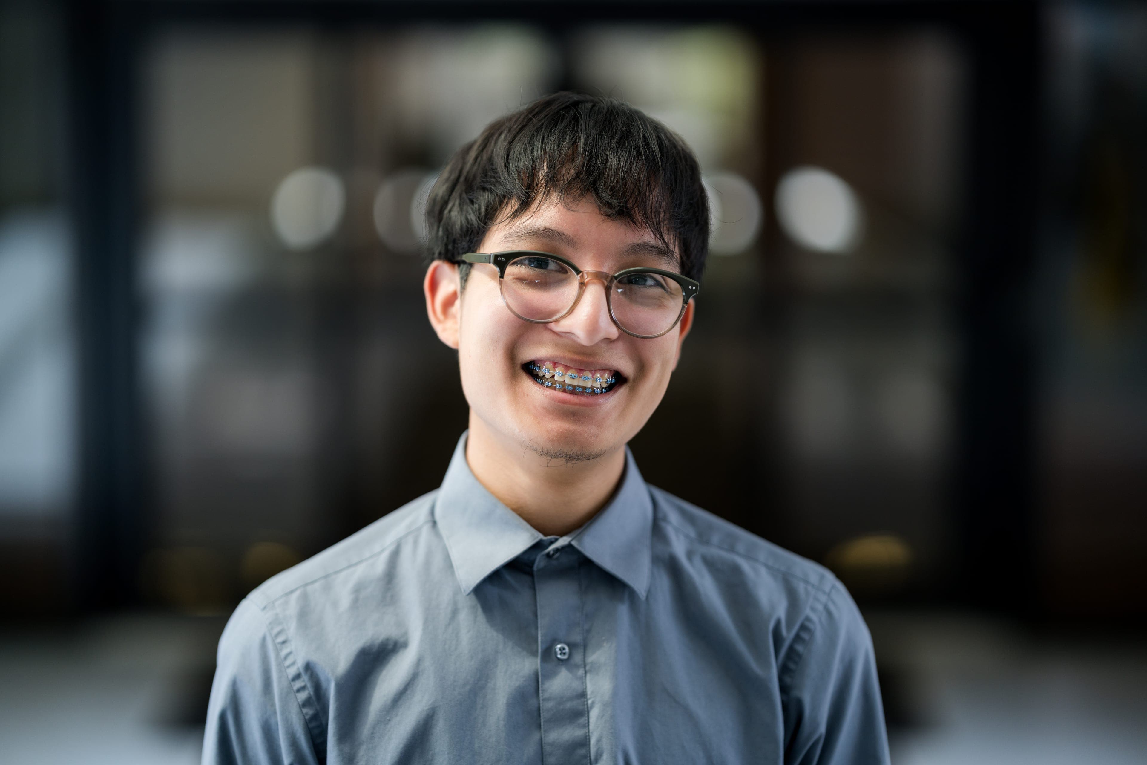 A smiling Atlas Scholar during the Summer Institute