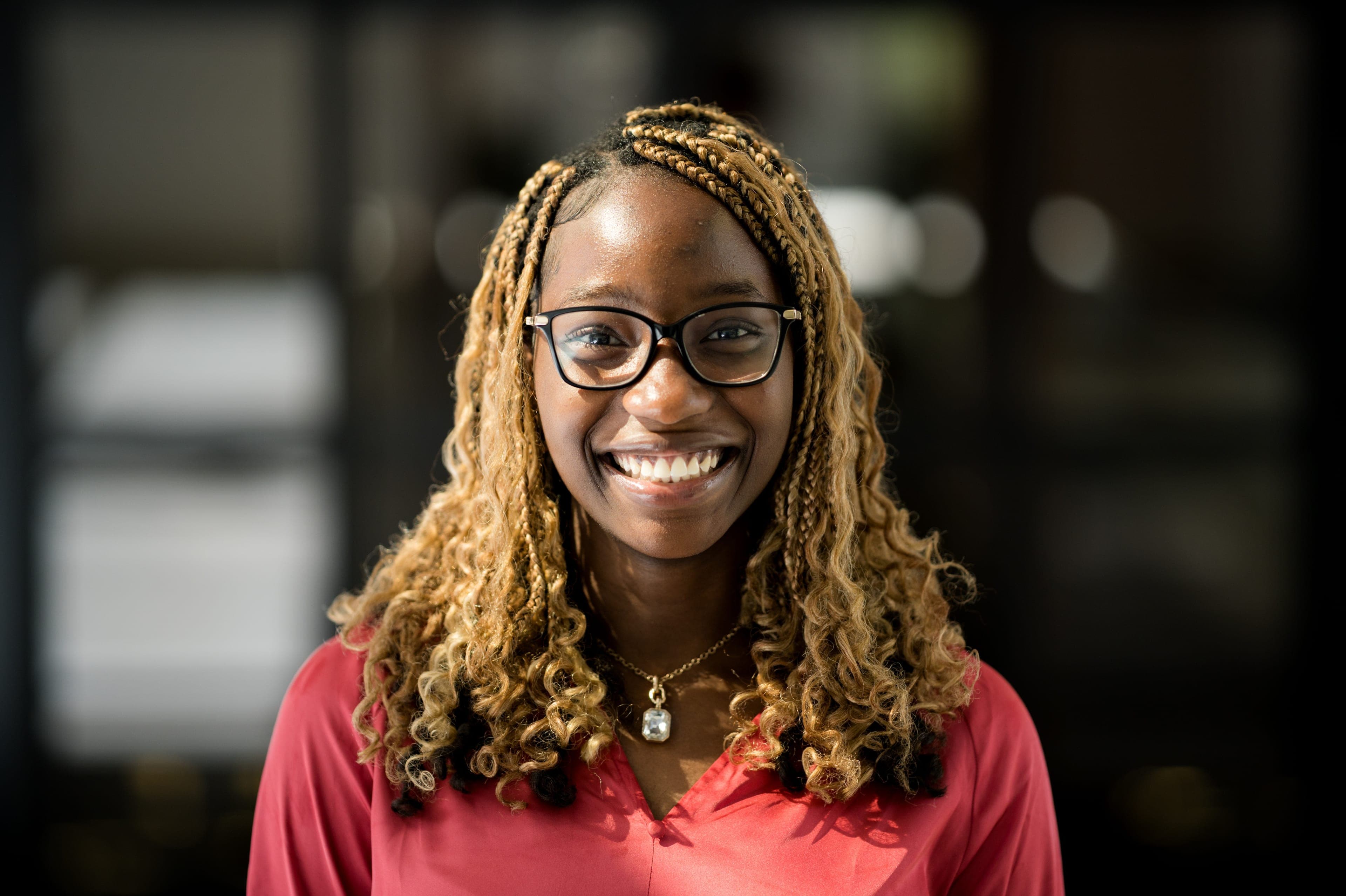 An Atlas Scholar smiling during the Summer Institute